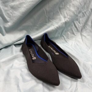 Rothy's Elegant Black Flats with Blue Trim
